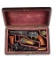 (A) CASED PAIR OF COLT MODEL 1849 POCKET AND 1855 ROOT PERCUSSION REVOLVERS.