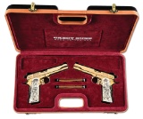 (M) MIRROR IMAGE PAIR OF CABOT GUNS GOLDEN SCORPTION 1911A1 .45 ACP SEMI-AUTOMATIC PISTOLS FROM THE