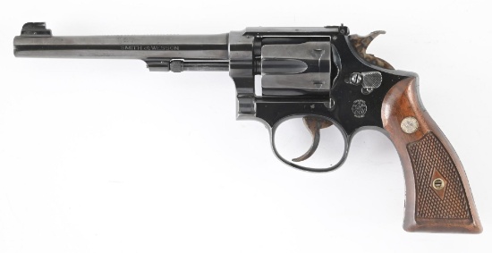 (C) SMITH & WESSON K-22 OUTDOORSMAN DOUBLE ACTION REVOLVER.