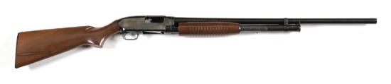 (C) WINCHESTER MODEL 12 SLIDE ACTION SHOTGUN.