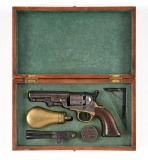 (A) CASED COLT MODEL 1849 POCKET PERCUSSION REVOLVER (1866).
