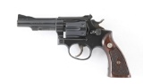 (C) SMITH & WESSON MODEL K-22 COMBAT MASTERPIECE DOUBLE ACTION REVOLVER.