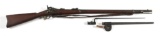 (A) US SPRINGFIELD MODEL 1879 TRAPDOOR RIFLE WITH BAYONET.