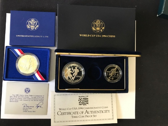 1986 Liberty Silver Dollar and 1994 World Cup Coin Set