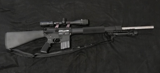 DPMS Panther Arms Model A-15 Semi Auto in a .223 or 5.56 caliber with a Tasco 3x12 Scope