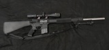 DPMS Panther Arms Model A-15 Semi Auto in a .223 or 5.56 caliber with a Tasco 3x12 Scope