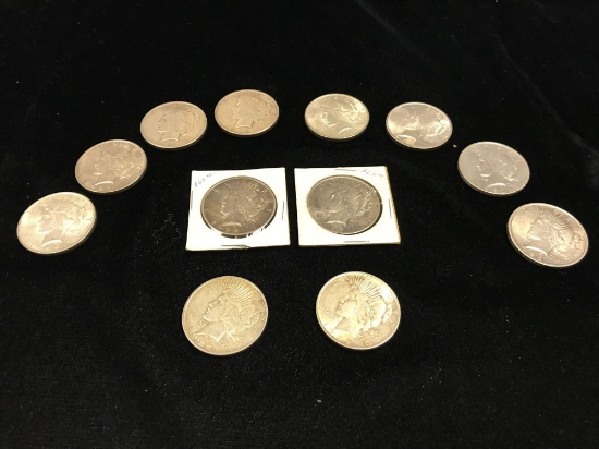 12 Peace Silver Dollars