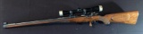 Bolt Action 6mm REM Rifle with Leupold Scope
