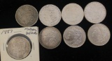 Lot of 8 Morgan Silver Dollars