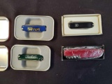 3 Victorinox Swiss Army Knives and a Multi Purpose Knife