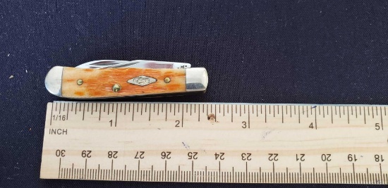 W.R. Case & Sons Cutlery Co., Item no. 09803, 154 62154W SS. Tiny Trapper BN PS, Sunset Orange