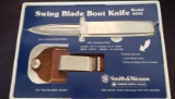 Smith & Wesson sports Man's Knife, Swing Blade Boot Knife, Model 6042, with leather sheath