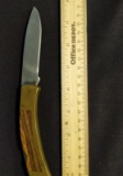 Gerber knife, 4.5' in brass handle, 3.5