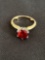 Ladies 14K Yellow Gold Ring with Red Solitaire Stone with Platinum Prongs