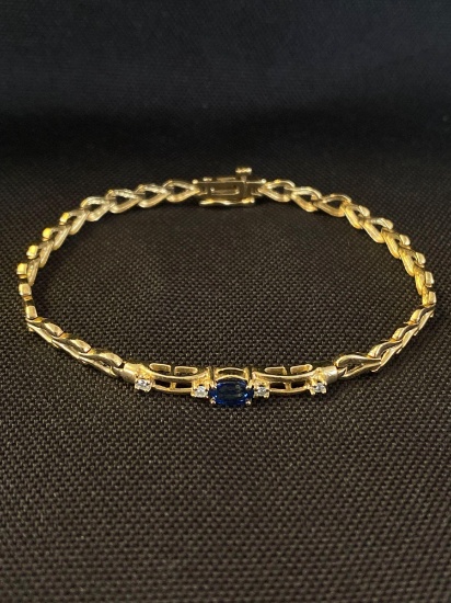 Fashion Bracelet in 14K Yellow Gold with One Center Oval Sapphire