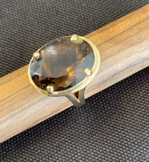 14K Yellow Gold Ring Containing 1 approximately 4ct. Oval Smokey Quartz and Pendant