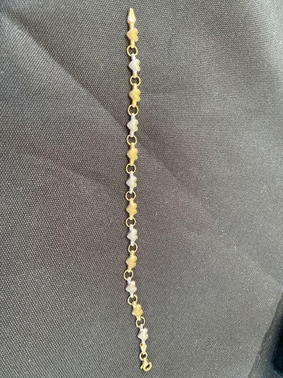7" 10K Yellow and White Gold Heart Bracelet