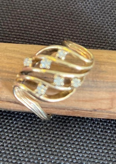 14K Yellow Gold Ring Containing 6 Small Round Diamonds
