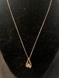 Fashion Pendant in 14K Yellow Gold with One Pear Shaped Blue Topaz, 6 x 4mm stone