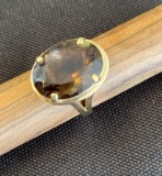 14K Yellow Gold Ring Containing 1 approximately 4ct. Oval Smokey Quartz and Pendant