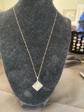 14k Yellow and White Gold and Diamond Pendant on 18