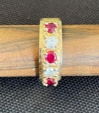 14K Yellow Gold Ring Containing 3 Red Synthetic Stones and 2 White Synthetic Stones