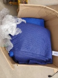 Box of packing blankets