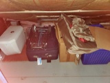 Group of Luggage and plumbing supplies