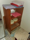 Small wooden shelf and contents