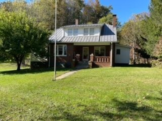 Charming 4 Bedroom 3 Bath Brick Home on Approximately 5 Acres