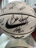 West Virginia basketball signed by Coach Bob Huggins and 13 basketball players. Nike basketball and