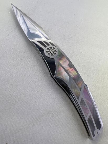 Believed to be made by Corrado Moro but it is unmarked