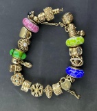 Pandora Charm Bracelet 70.49 grams total weight including glass charms