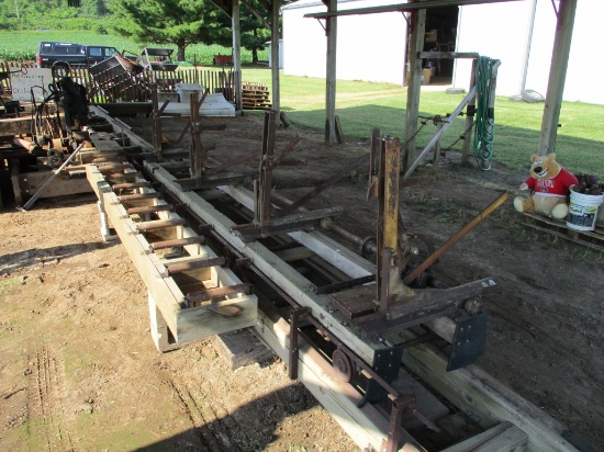 Saw mill 44' long, 4 bar carriage, converted from friction to Hyd drive, 40" saw blade