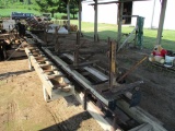 Saw mill 44' long, 4 bar carriage, converted from friction to Hyd drive, 40