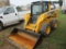 John Deere 325, 1,097 hrs. cab, AC, heatm 2sp. hyd latch, hand controls, JD 76