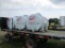 (3) 500 gal tanks mounted on 18' steel flat bed **RUNNING GEAR DOES NOT SELL