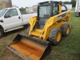 John Deere 325, 1,097 hrs. cab, AC, heatm 2sp. hyd latch, hand controls, JD 76