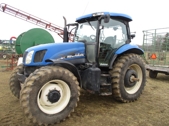 New Holland TS135 MFWD. Hours unknown, cab, left hand reverser, 3pt. 4 hyd PTO, 18.4Rx38, 14.9Rx28,