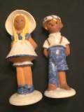 SCHOOL BOY AND SCHOOL GIRL FIGURINES - BOY HAS GLAZE CHIPS, GIRL HAS SMALL CHIP BTM