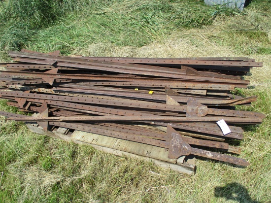Large pile of steel fence post