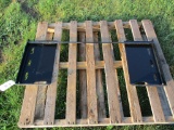 Universal skid loader mount plate