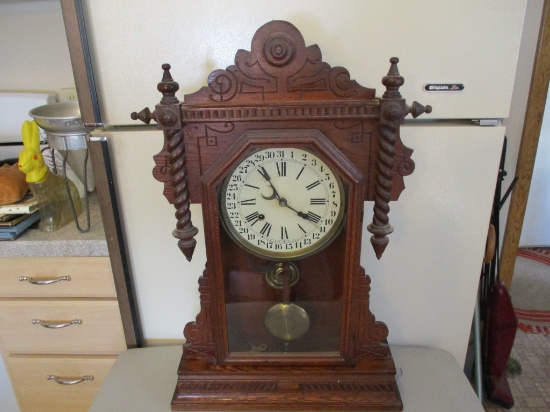 Waterbury wooden case clock, pendulum & key