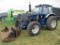 Ford 7710 MFWD, 6,333 Hrs. showing, cab, w/Allied 594  hyd loader 7' bucket & bale fork, 3pt. 3 hyd
