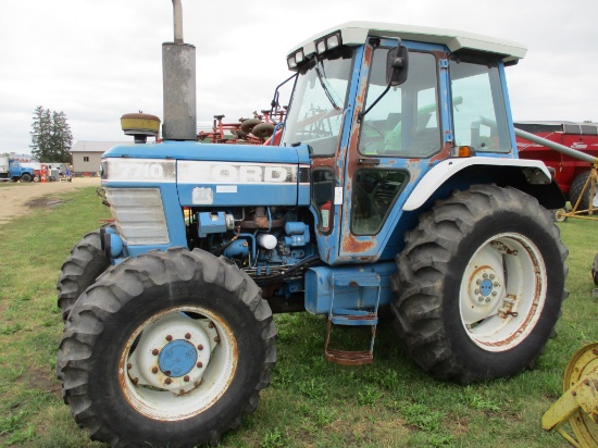 Ford 7710 II, MFWD, cab, 3Pt. 3 Hyd, PTO, 18.4x34 & band duals, Has a power steering lead & will not