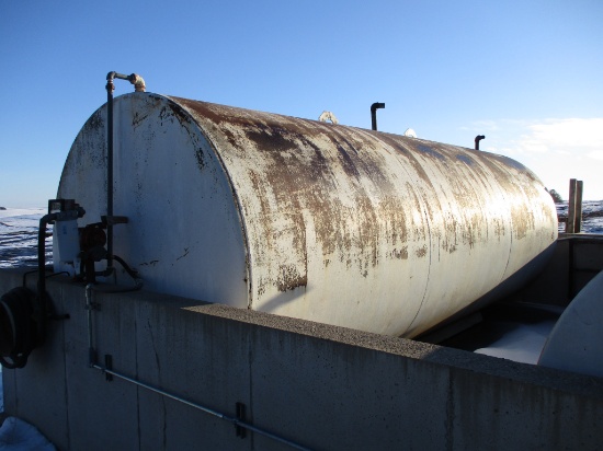 8,000 Gallon fuel tank w/elect pump, tank is set in concrete confinement, Buyer is responsible for