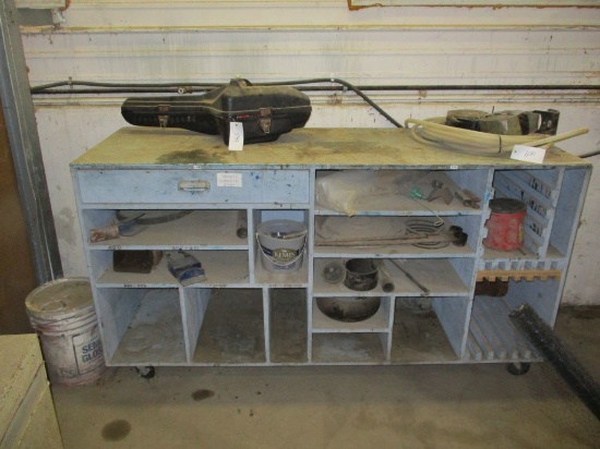 Wood cabinet with misc. 72'' x 34''