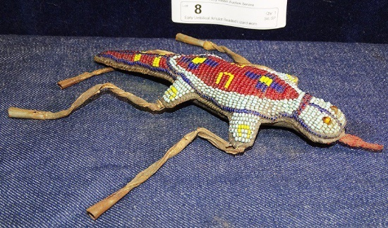 Early Umbilical Amulet Beaded Lizard worn GoodLuck