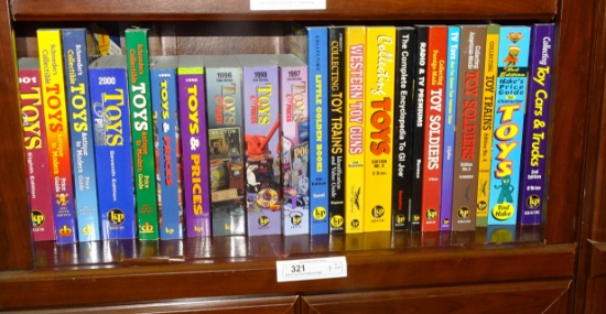Shelf of Toy Price Guides Like New