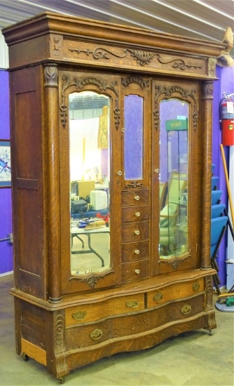 CIRCA 1900'S DOUBLE OAK WARDROBE W/BEVEL MIRRORS